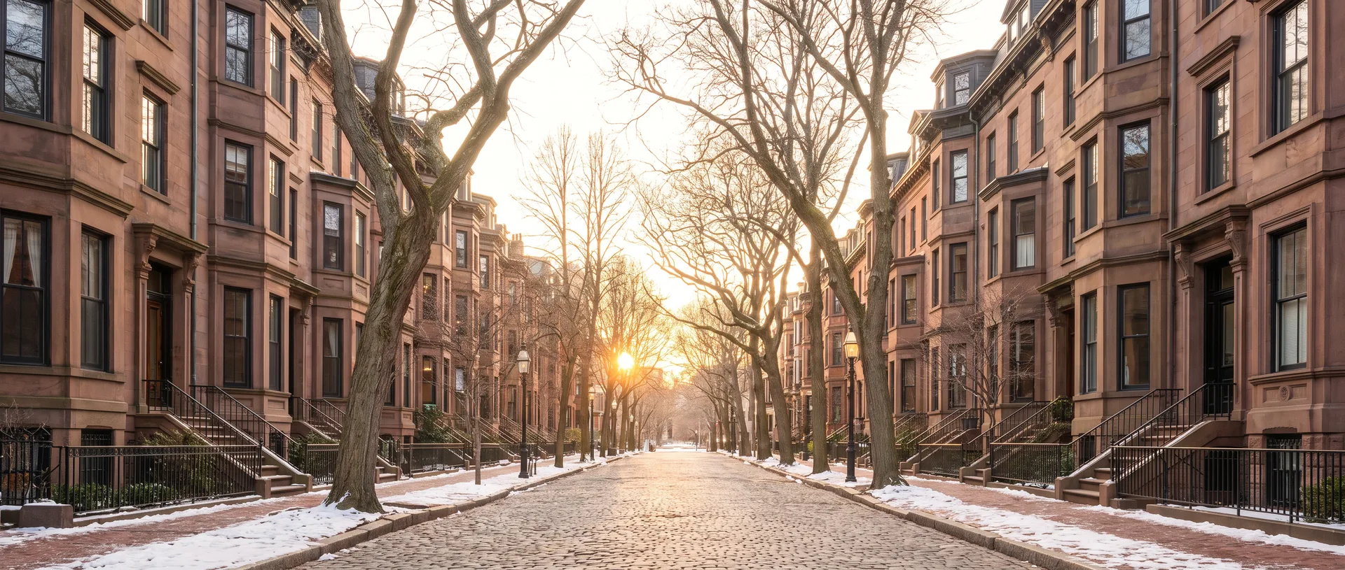 An early-morning street in a northeastern city, low winter sun